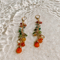 Coral Garden Earrings in 14k gold fill, styled on pale sand at the beach
