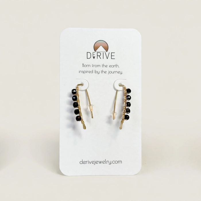 Mini Black Tourmaline Threader Earrings in 14k gold fill with faceted black tourmaline beads wire wrapped along each threader, second view on a Derive Jewelry earring card