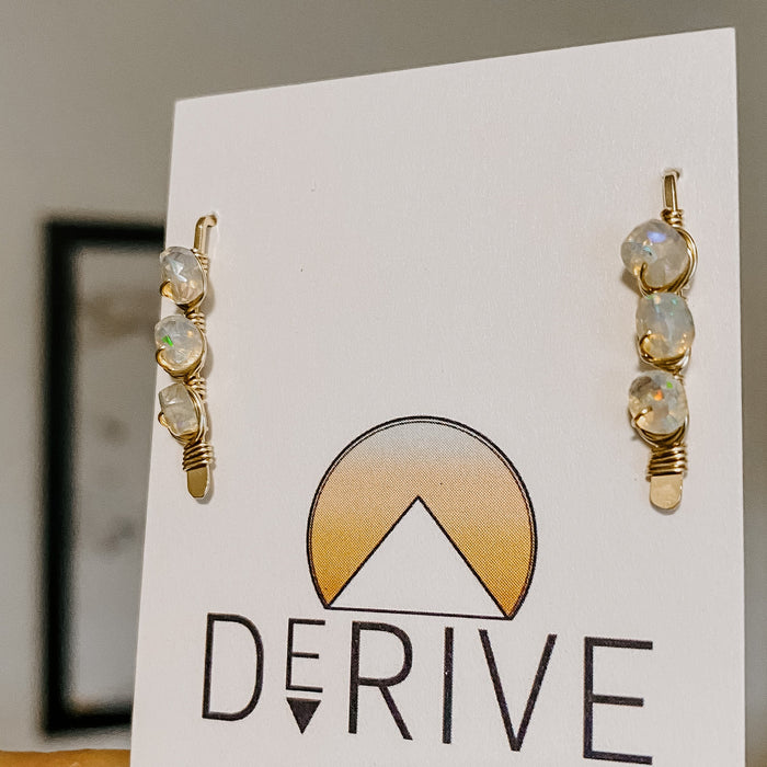 Opal Ear Climbers in sterling silver — side view