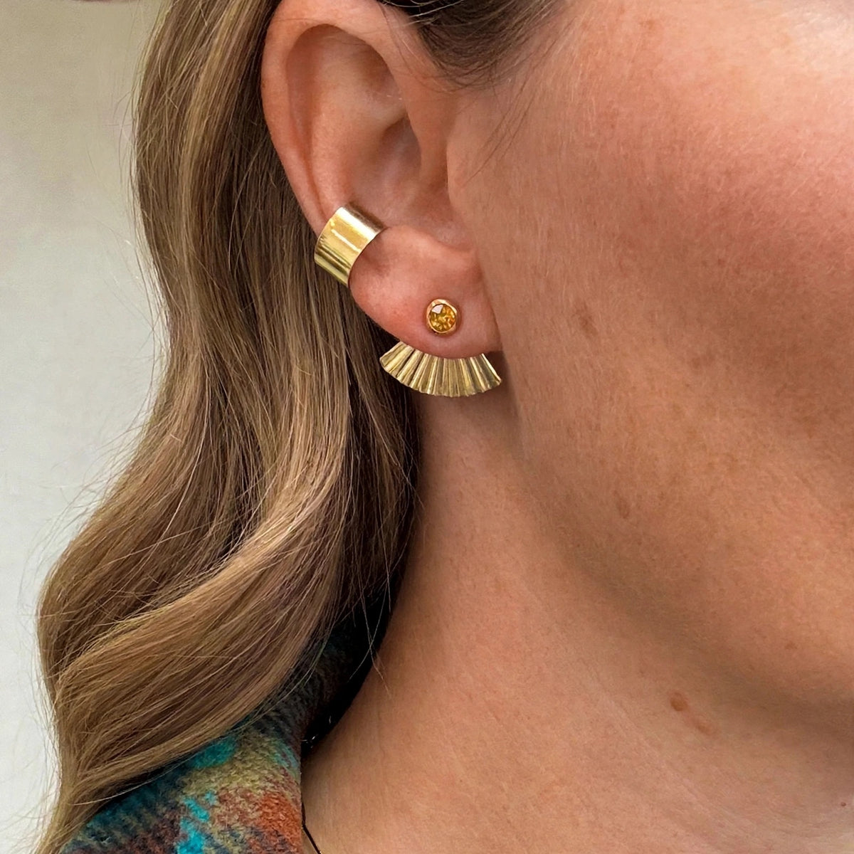 Sunset Citrine Ear Jacket Earrings in 14k gold fill, worn with the pleated fan jacket behind the ear